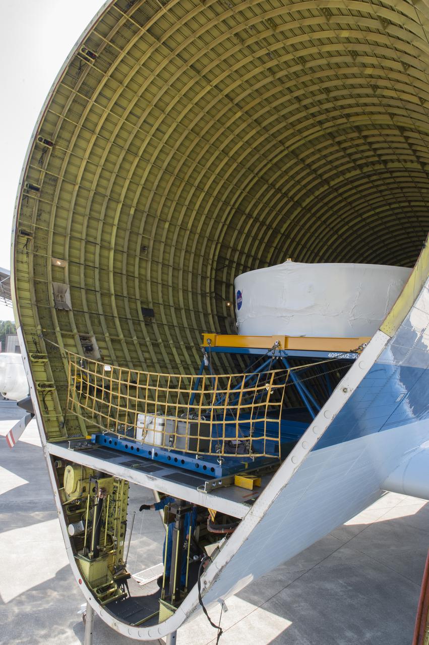 The Orion stage adapter shown inside the cargo bay of NASA's Super Guppie aircraft prior to being flown to Denver, Colorado for further testing.