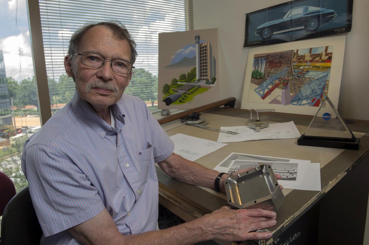 Neill Myers, Marshall’s most patented inventor, demonstrates the Variable-Aperture Reciprocating Reed Valve, an invention that won him his fourth Marshall Invention of the Year award.