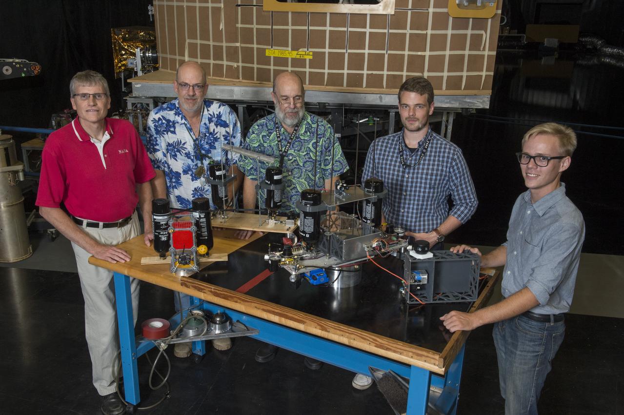 Electric Sail (E-Sail) Tether Team with 6U CubeSat Prototypes and Current Version of Tether Deployer Test Article, (Right to left:  Tom Bryan, Davis Hunter (student intern), Jonathan MacArthur (student intern), Charles Cowen, Mike Tinker)