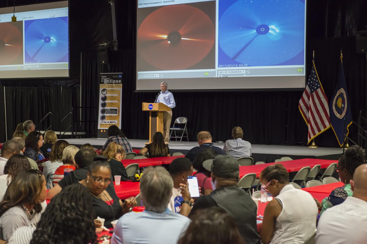 Former Spacelab 1 mission scientist Rick Chappell addresses Marshall team members during the Aug. 21 eclipse-watching event in Activities Building 4316. Chappell, a former associate director for science at Marshall and now a physics professor at Vanderbilt University in Nashville, joined a throng of Marshall personnel to marvel at the eclipse. 