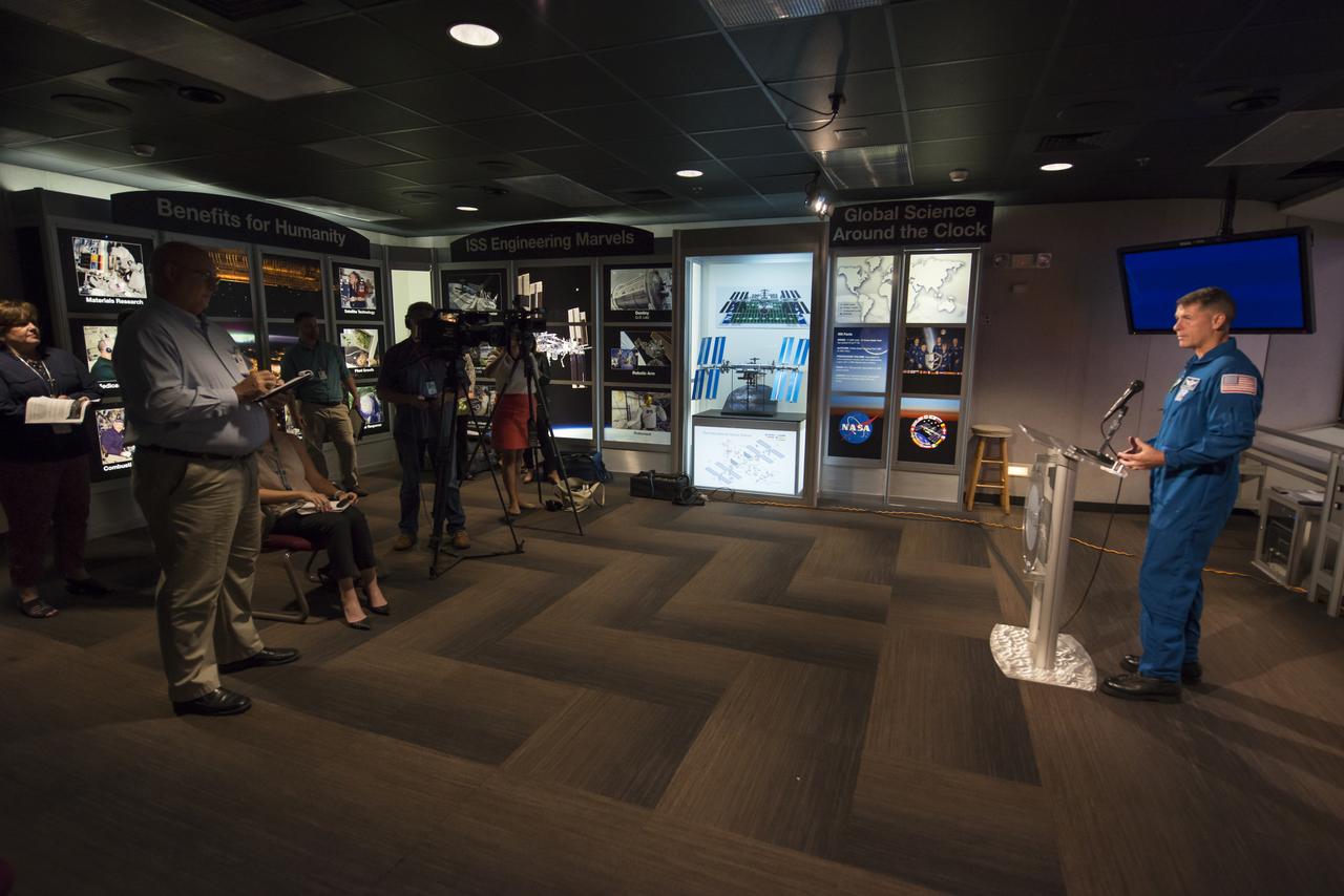 Expedition 49/50 Astronaut Shane Kimbrough briefs the press on his extended mission to the International Space Station in the Marshall Space Flight Center Payload Operations Integration Center (POIC).