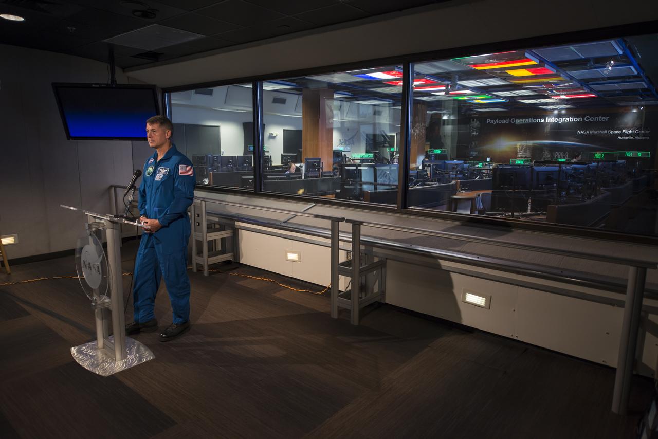 Expedition 49/50 Astronaut Shane Kimbrough briefs the press on his extended mission to the International Space Station in the Marshall Space Flight Center Payload Operations Integration Center (POIC).