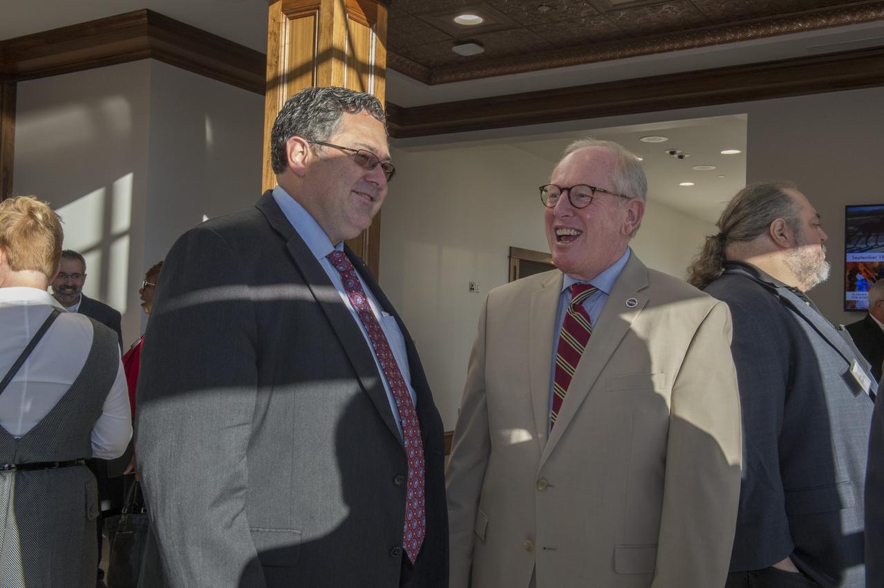 The Morgan County Economic Development Association and the City of Decatur, in Partnership with the NASA/Marshall Space Flight Center (MSFC), hosted a business forum on, How to Launch Your Business with NASA, Wednesday, October 18, 2017, at the Alabama Center for the Arts in downtown Decatur, AL.  The event was open to all businesses allowed them to connect with Senior NASA representatives and their prime contractors. The program guided businesses through the process of working with NASA as a supplier, subcontractor, and/or a service provider. The Marshall Space Flight Center’s projected procurement budget in FY 2018 is approximately $2.2 billion and numerous procurement opportunities are available for small business participation each fiscal year.  The program included Todd May, Director of Marshall Space Flight Center; Johnny Stephenson, Director of Marshall Space Flight Center’s Office of Strategic Analysis and Communication; David Brock, Small Business Specialist with Marshall Space Flight Center; and Lynn Garrison, Small Business Specialist Technical Advisor with Marshall Space Flight Center. Additionally, there was a prime contractor panel consisting of representatives from five NASA prime contractors.  The event included a dedicated networking session with those prime contractors.   The “Launch Your Business With NASA” event provides those in attendance the opportunity to network with key Marshall Space Flight Center procurement and technical personnel, and representatives of several major Marshall Space Flight Center prime contractors.Arts. MSFC Director Todd May and Decatur Mayor Tab Bowling enjoy a light moment.
