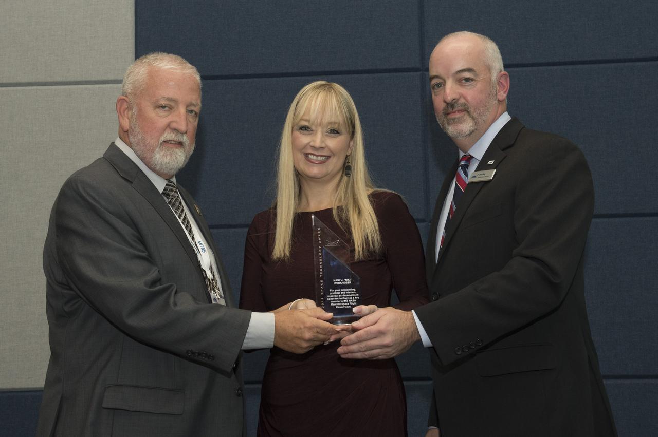 Mary J. "Niki" Werkheiser is presented the 2016 Space Technology Award during proceedings at the 10th annual Dr. Wernher von Braun Memorial Symposium at the University of Alabama, Huntsville, Alabama.