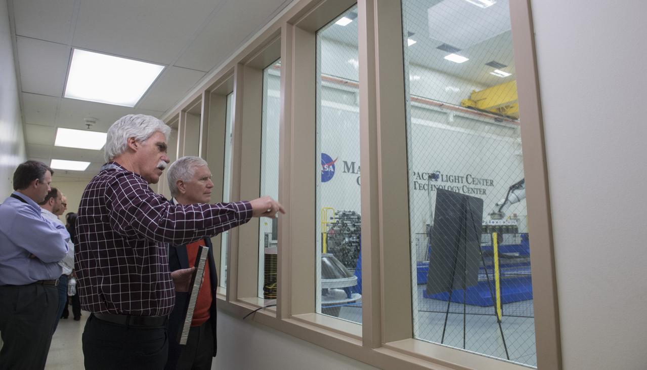 Congressman Mo Brooks visits MSFC to view Orion Stage Adapter flight hardware in bldg. 4708 and  Robotic Tape Laying and Additive Manufacturing Facility in bldg. 4707.