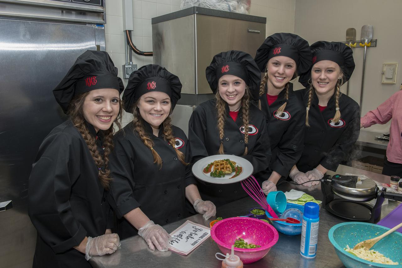 High Schools United with NASA to Create Hardware (HUNCH) students from 6 schools meet at the U.S. Space and Rocket center in order to participate in the annual culinary challenge where students create meals suitable for astronaut use in space. Students in 2018 created different dishes for breakfast dining. Other NASA centers also participate in this program with the top 10 voted recipes being judged at Johnson Space Center.