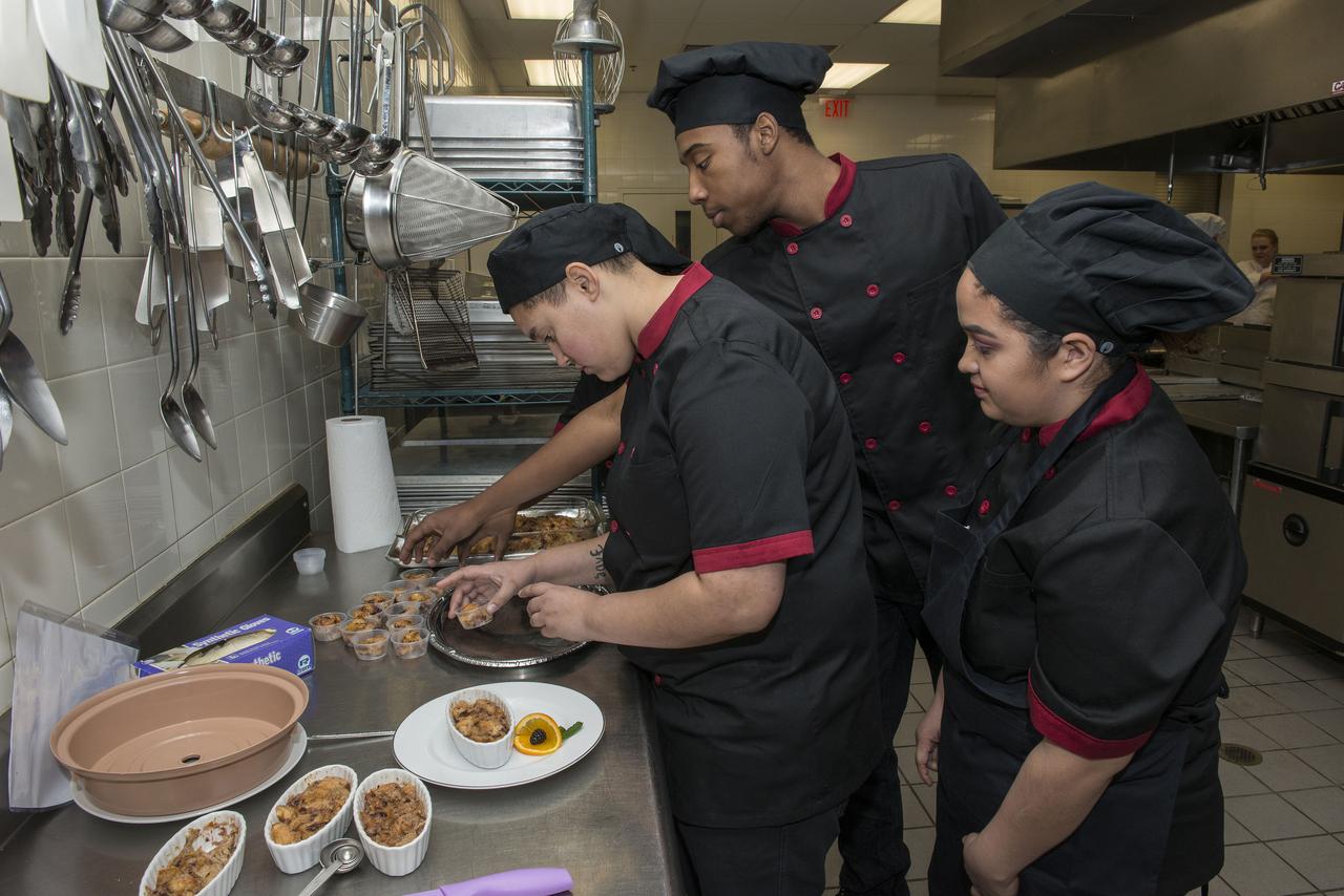 High Schools United with NASA to Create Hardware (HUNCH) students from 6 schools meet at the U.S. Space and Rocket center in order to participate in the annual culinary challenge where students create meals suitable for astronaut use in space. Students in 2018 created different dishes for breakfast dining. Other NASA centers also participate in this program with the top 10 voted recipes being judged at Johnson Space Center.