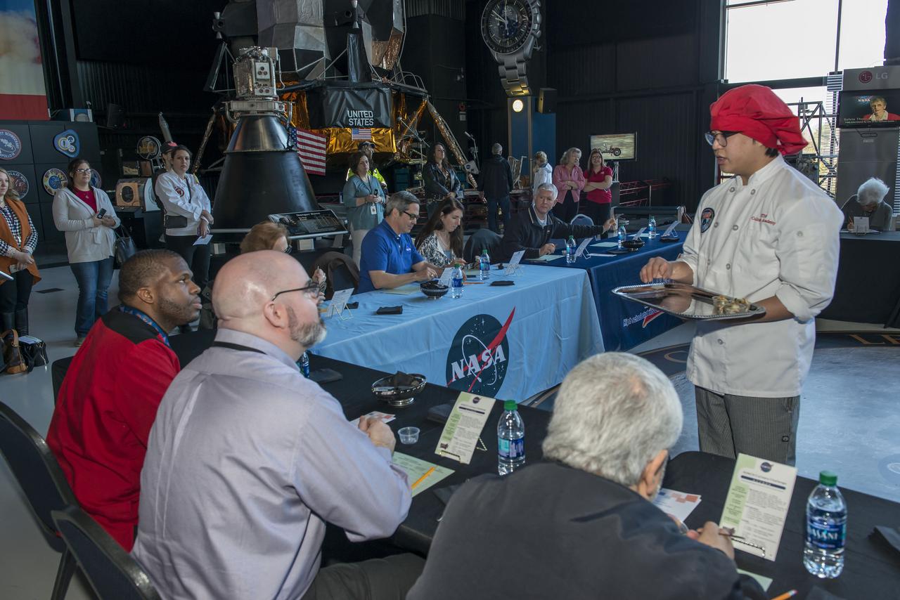 High Schools United with NASA to Create Hardware (HUNCH) students from 6 schools meet at the U.S. Space and Rocket center in order to participate in the annual culinary challenge where students create meals suitable for astronaut use in space. Students in 2018 created different dishes for breakfast dining. Other NASA centers also participate in this program with the top 10 voted recipes being judged at Johnson Space Center.