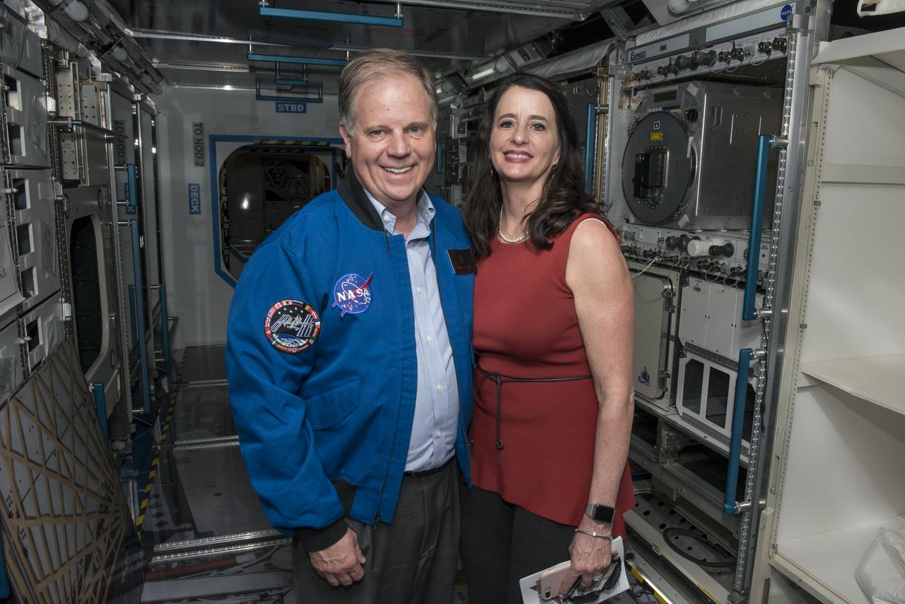 Senator Doug Jones (D-Al.) and wife Louise tour the Payload Crew Training Complex (PCTC) at Marshall Space Flight Center. The PCTC simulates International Space Station habitat modules and is interactive for different activities. 