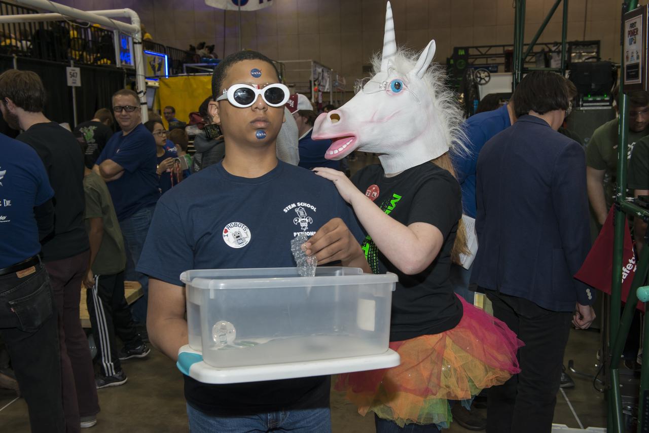 The First Robotics Rocket City Regional Competition was held at the Von Braun Civic Center in Huntsville, Alabama on March 16, 2018. High school robotics teams from throughout the U.S., as well as a team from Brazil, competed. Costumed students were the normal at this event and lent it much color.