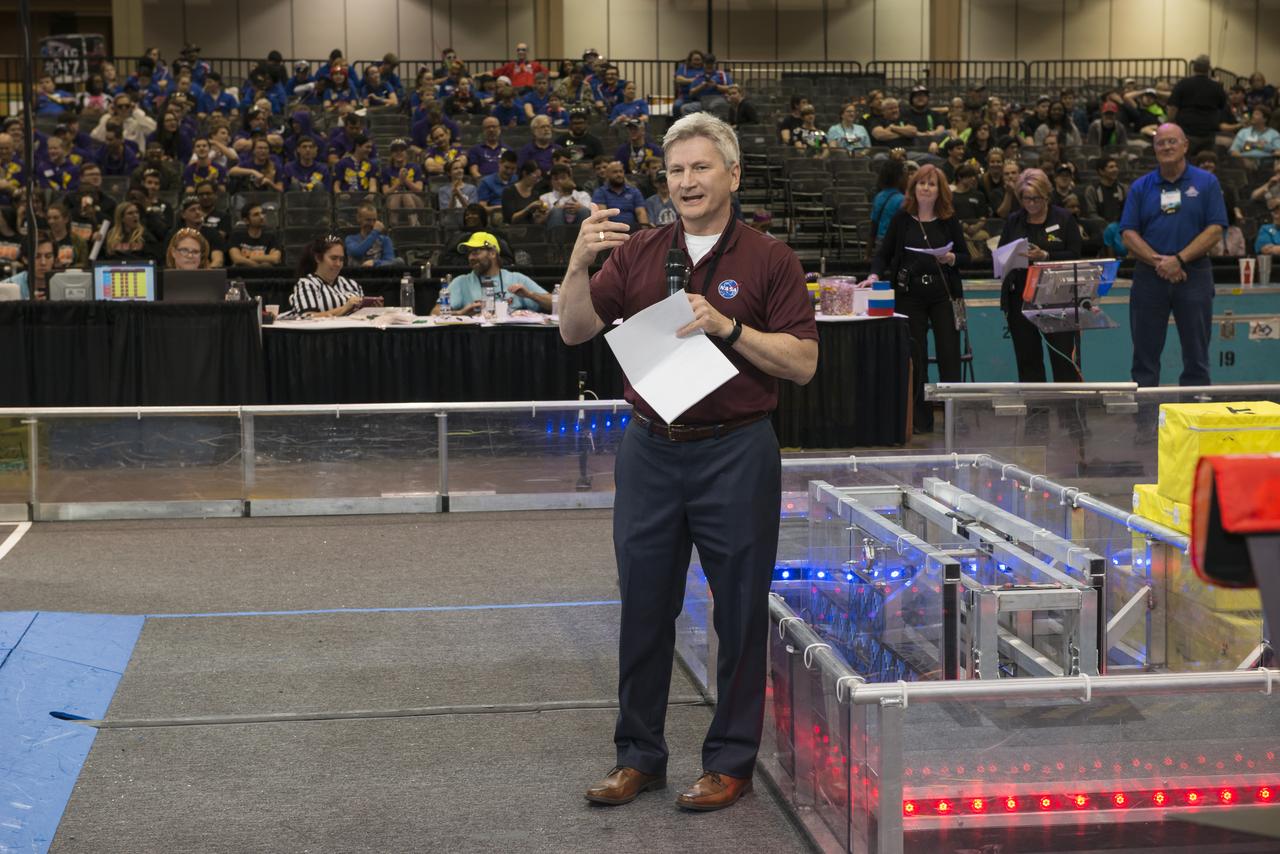 Johnny Stephenson, director of NASA Marshall Space Flight Center's Office of Strategic Analysis & Communications, addresses the crowd during the March 16 award ceremony following the first day of competition at the FIRST Robotics Rocket City Regional at the Von Braun Center in Huntsville. Ed Sparks, of the Morgan County Mech Tech team, received the award for Volunteer of the Year at the March 16 award ceremony. Mech Tech, comprised of students from five high schools in Morgan County, Alabama, also won the Industrial Design Award. The team was one of three regional finalists that will advance to the FIRST national championships April 18-21 in Houston. The other two regional finalists were Burning Magnetos of Fort Dorchester High School in North Charleston, South Carolina, and OGRE of Opelika High School in Opelika, Alabama. Mech Tech and Golden Hurricane from Columbia High School in Huntsville, were "house" teams sponsored by Marshall.