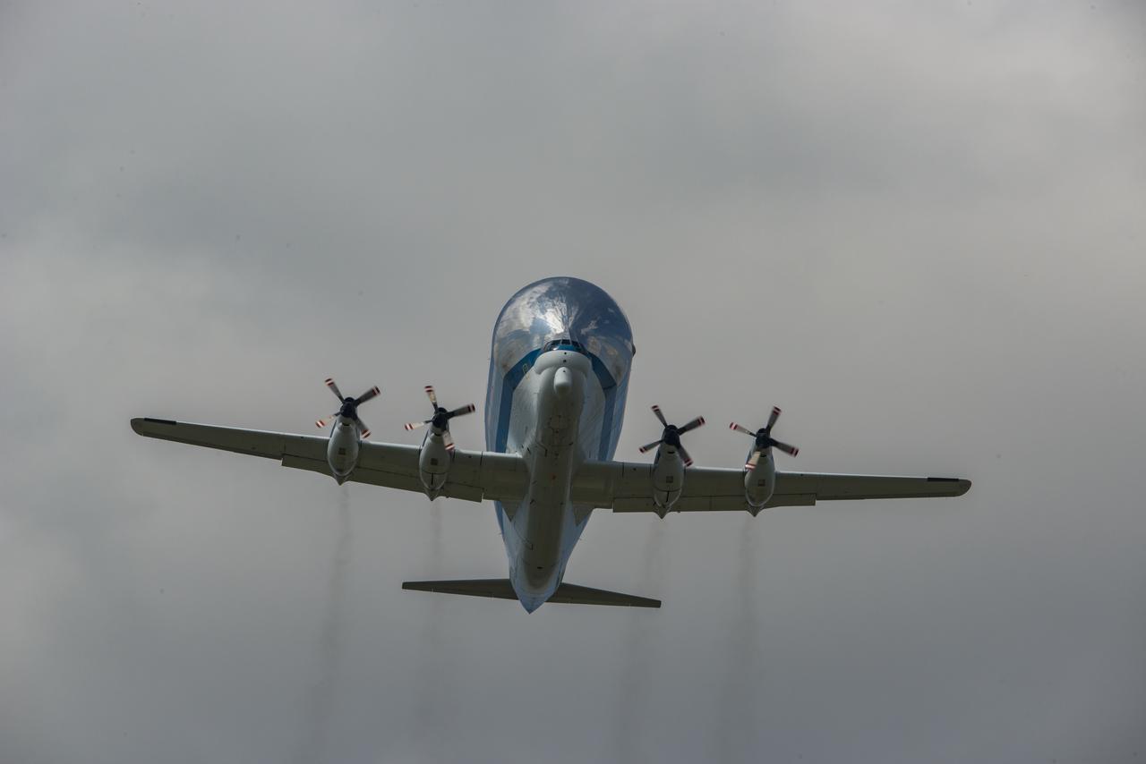 Caption: NASA's Super Guppy aircraft arrives to the U.S. Army’s Redstone Airfield in Huntsville, Alabama, April 2, to pick up flight hardware for NASA’s Space Launch System – its new, deep-space rocket that will enable astronauts to begin their journey to explore destinations far into the solar system. The Guppy will depart on Tuesday, April 3 to deliver the Orion stage adapter to NASA’s Kennedy Space Center in Florida for flight preparations. On Exploration Mission-1, the first integrated flight of the SLS and the Orion spacecraft, the adapter will connect Orion to the rocket and carry 13 CubeSats as secondary payloads. 