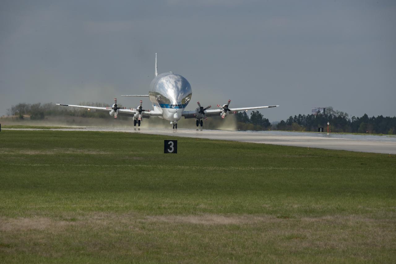 Caption: NASA's Super Guppy aircraft arrives to the U.S. Army’s Redstone Airfield in Huntsville, Alabama, April 2, to pick up flight hardware for NASA’s Space Launch System – its new, deep-space rocket that will enable astronauts to begin their journey to explore destinations far into the solar system. The Guppy will depart on Tuesday, April 3 to deliver the Orion stage adapter to NASA’s Kennedy Space Center in Florida for flight preparations. On Exploration Mission-1, the first integrated flight of the SLS and the Orion spacecraft, the adapter will connect Orion to the rocket and carry 13 CubeSats as secondary payloads. 