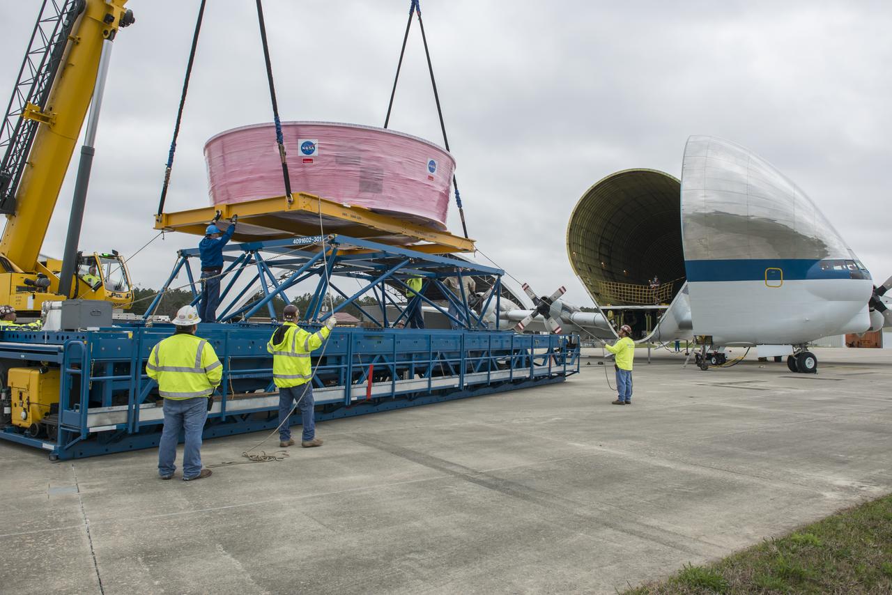  NASA's Super Guppy aircraft arrives to the U.S. Army’s Redstone Airfield in Huntsville, Alabama, April 2, to pick up flight hardware for NASA’s Space Launch System – its new, deep-space rocket that will enable astronauts to begin their journey to explore destinations far into the solar system. The Guppy will depart on Tuesday, April 3 to deliver the Orion stage adapter to NASA’s Kennedy Space Center in Florida for flight preparations. On Exploration Mission-1, the first integrated flight of the SLS and the Orion spacecraft, the adapter will connect Orion to the rocket and carry 13 CubeSats as secondary payloads.