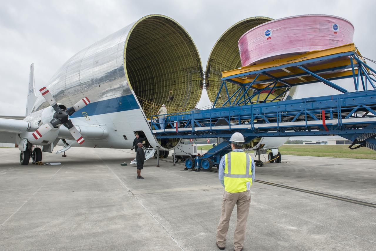  NASA's Super Guppy aircraft arrives to the U.S. Army’s Redstone Airfield in Huntsville, Alabama, April 2, to pick up flight hardware for NASA’s Space Launch System – its new, deep-space rocket that will enable astronauts to begin their journey to explore destinations far into the solar system. The Guppy will depart on Tuesday, April 3 to deliver the Orion stage adapter to NASA’s Kennedy Space Center in Florida for flight preparations. On Exploration Mission-1, the first integrated flight of the SLS and the Orion spacecraft, the adapter will connect Orion to the rocket and carry 13 CubeSats as secondary payloads.