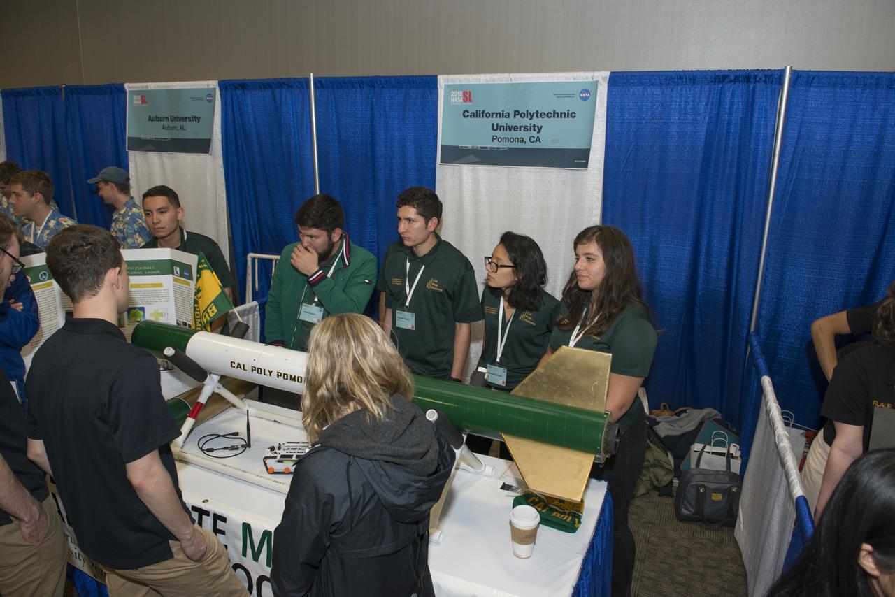 Students from 23 states display their rockets and talk about what they did to make them fly at the NASA Student Launch Rocket Fair on Friday, April 6. Over 800 students traveled to Huntsville, Alabama, to participate in a week of activities as part of NASA Student Launch.