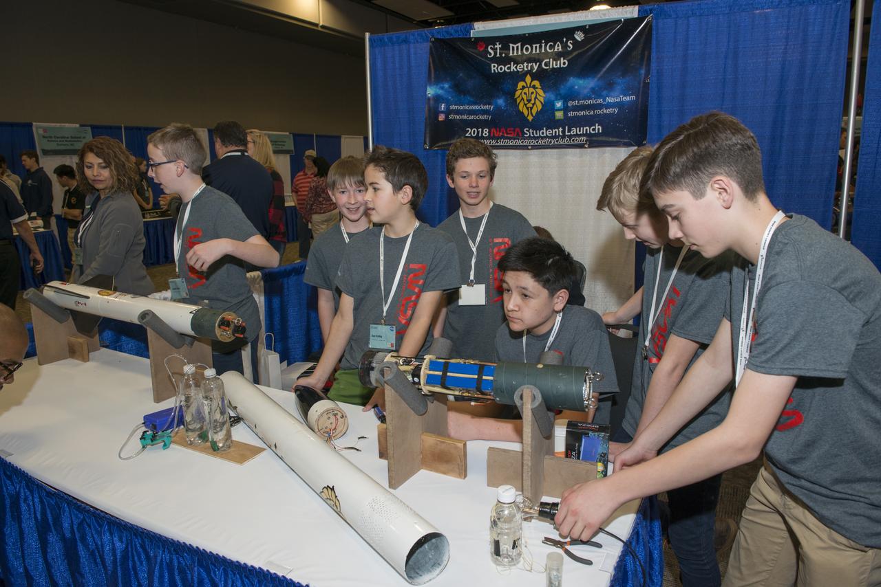 Students from 23 states display their rockets and talk about what they did to make them fly at the NASA Student Launch Rocket Fair on Friday, April 6. Over 800 students traveled to Huntsville, Alabama, to participate in a week of activities as part of NASA Student Launch.