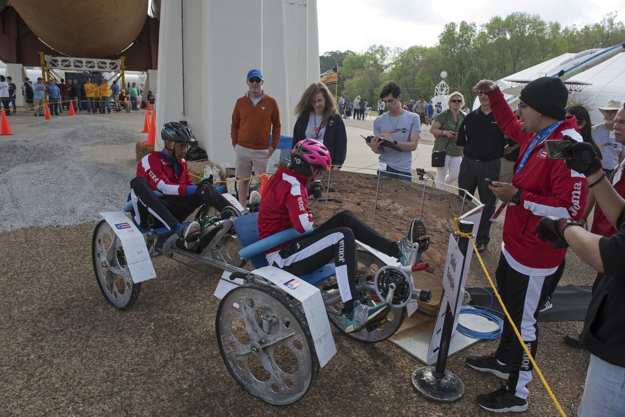  High school and university students competed in the 2018 Human Exploration Rover Challenge event at the U.S. Space and Rocket Center in Huntsville, Alabama. Students came from across the U.S. as well as several foreign countries such as Brazil, Germany, India, and Mexico. This event, which is normally a 2 day event, was shortened to 1 day in 2018 due to adverse weather conditions.