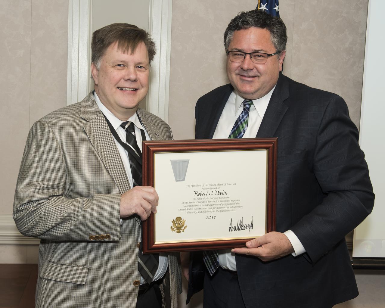 On April 23, 2018, Todd May presented Robert (Bob) Devlin with the 2017 Presidential Rank Award for Meritorious Executive.  This is the second-highest award conferred by the President of the United States.  Individuals receiving this award are recognized for sustained accomplishments and no more than five percent of career SES or SL/ST members may receive this award.