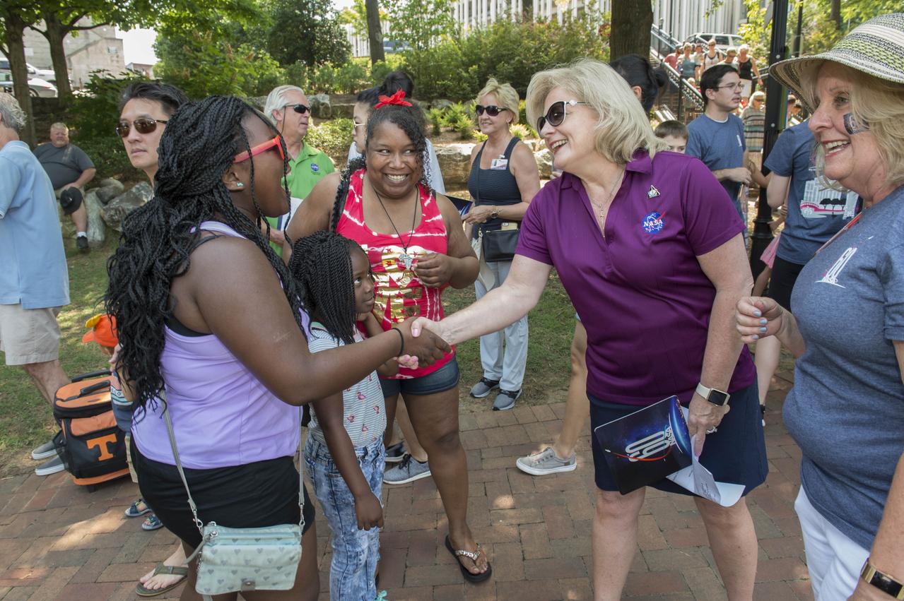 NASA in the Park on June 16 in Huntsville featured more than 60 exhibits and demonstrations by NASA experts, as well as performances by Marshall musicians, educational opportunities, games and hands-on activities for all ages.  MSFC Deputy Director Jody Singer welcomes soloist Alyssa Slocum who sang the National Anthem to officially open NASA in the Park activities. 