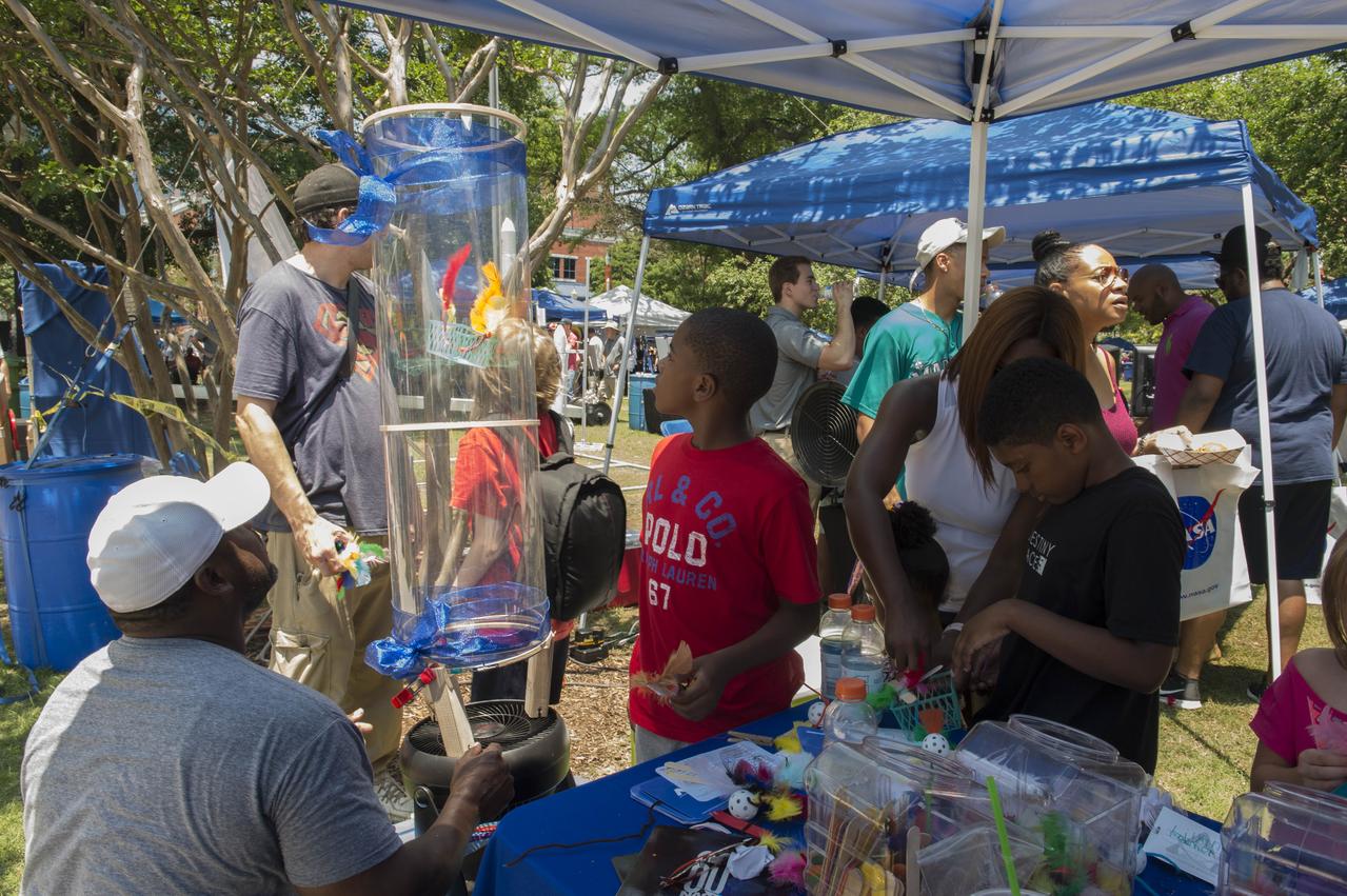 NASA in the Park on June 16 in Huntsville featured more than 60 exhibits and demonstrations by NASA experts, as well as performances by Marshall musicians, educational opportunities, games and hands-on activities for all ages.  Many of the exhibits at NASA in the Park were interactive. 