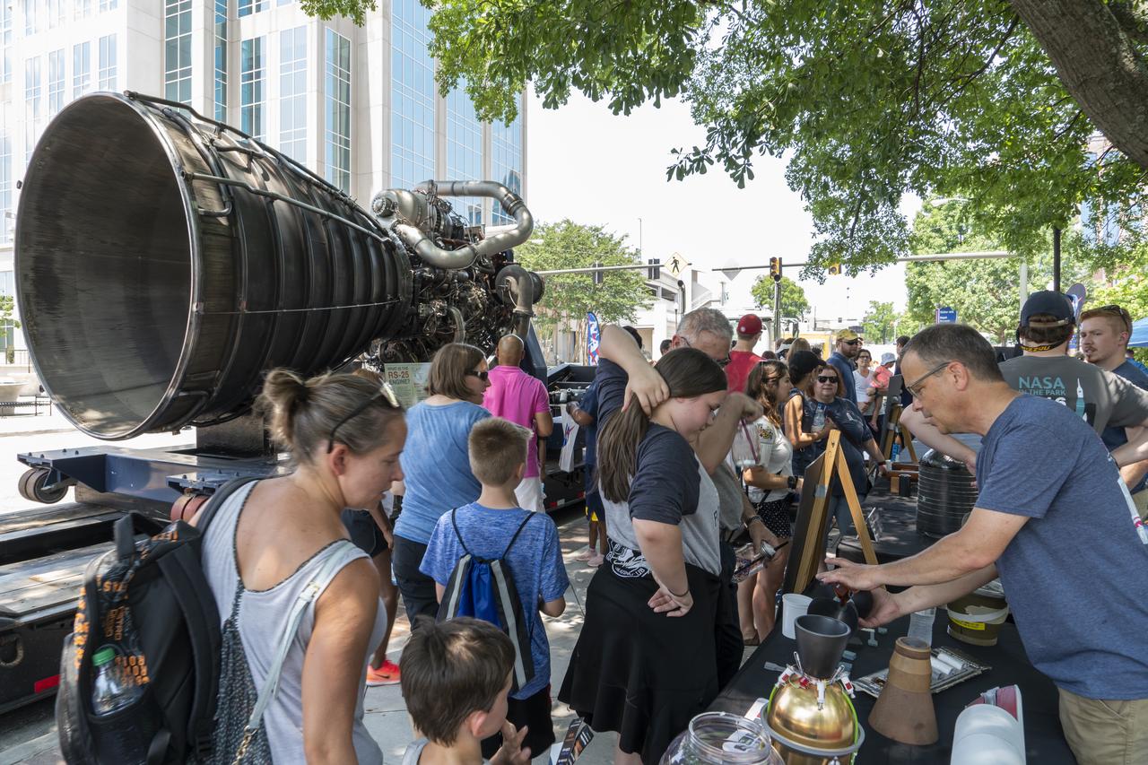 NASA's Marshall Space Flight Center showcased it's various projects for the public in Huntsville, Alabama's Big Spring Park. Exhibits were displayed by all of the various directorates of the Center with employee volunteers explaining all aspects of their projects. Adding to the festivities was the attendance of retired NASA astronaut Robert "Hoot" Gibson. With a RS-25 engine in the background, NASA employees and volunteers demonstrate NASA technology at NASA in the Park.