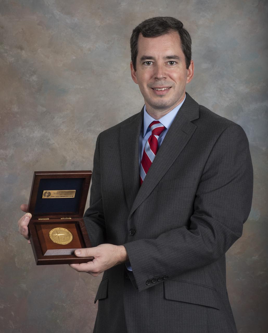 Phillip Allen with NASA Software of the Year Award
