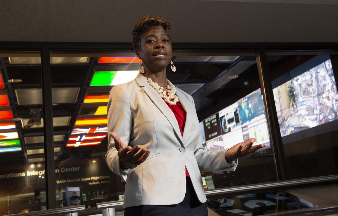 Dr. Ruth Jones, Branch Chief for Industrial Safety Branch (QD12) at MSFC, talks safety issues in the Payload Operation Integration Center. Photo for publication in University of Arkansas, Pine Bluff, Alumni magazine.  