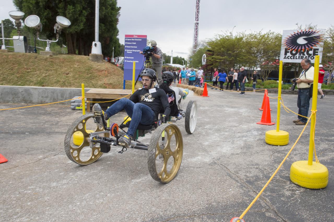 The 2019 Lunar Rover Challenge Competition was hosted by the U.S. Space and Rocket Center in Huntsville, Alabama. This annual event celebrated the 25th anniversary of what began as the Great Moonbuggy Race in 1994. High school and College teams from the United States and foreign countries competed. The awards ceremony was held at the adjacent Marriott on Saturday evening.