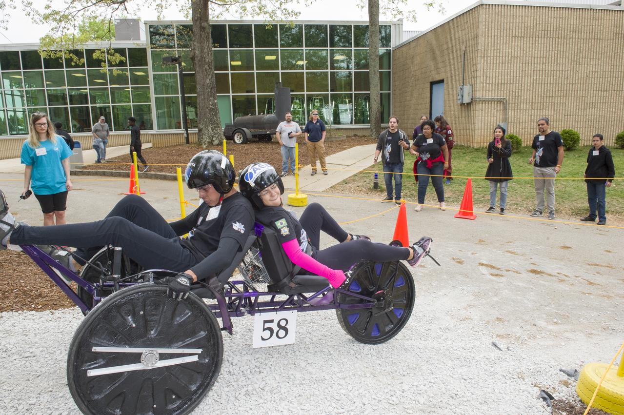 The 2019 Lunar Rover Challenge Competition was hosted by the U.S. Space and Rocket Center in Huntsville, Alabama. This annual event celebrated the 25th anniversary of what began as the Great Moonbuggy Race in 1994. High school and College teams from the United States and foreign countries competed. The awards ceremony was held at the adjacent Marriott on Saturday evening.