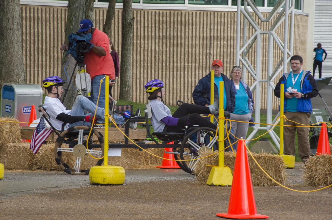 The 2019 Lunar Rover Challenge Competition was hosted by the U.S. Space and Rocket Center in Huntsville, Alabama. This annual event celebrated the 25th anniversary of what began as the Great Moonbuggy Race in 1994. High school and College teams from the United States and foreign countries competed. The awards ceremony was held at the adjacent Marriott on Saturday evening.