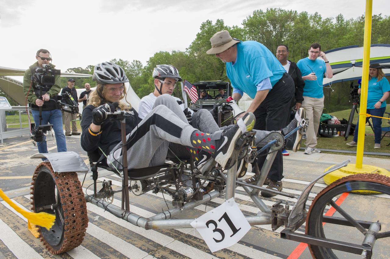 The 2019 Lunar Rover Challenge Competition was hosted by the U.S. Space and Rocket Center in Huntsville, Alabama. This annual event celebrated the 25th anniversary of what began as the Great Moonbuggy Race in 1994. High school and College teams from the United States and foreign countries competed. The awards ceremony was held at the adjacent Marriott on Saturday evening.