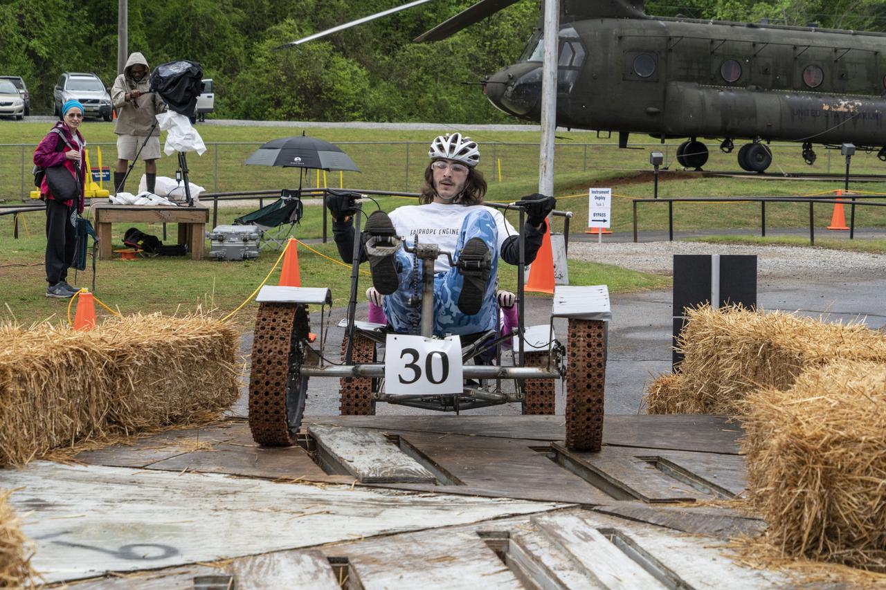 The 2019 Lunar Rover Challenge Competition was hosted by the U.S. Space and Rocket Center in Huntsville, Alabama. This annual event celebrated the 25th anniversary of what began as the Great Moonbuggy Race in 1994. High school and College teams from the United States and foreign countries competed. The awards ceremony was held at the adjacent Marriott on Saturday evening.
