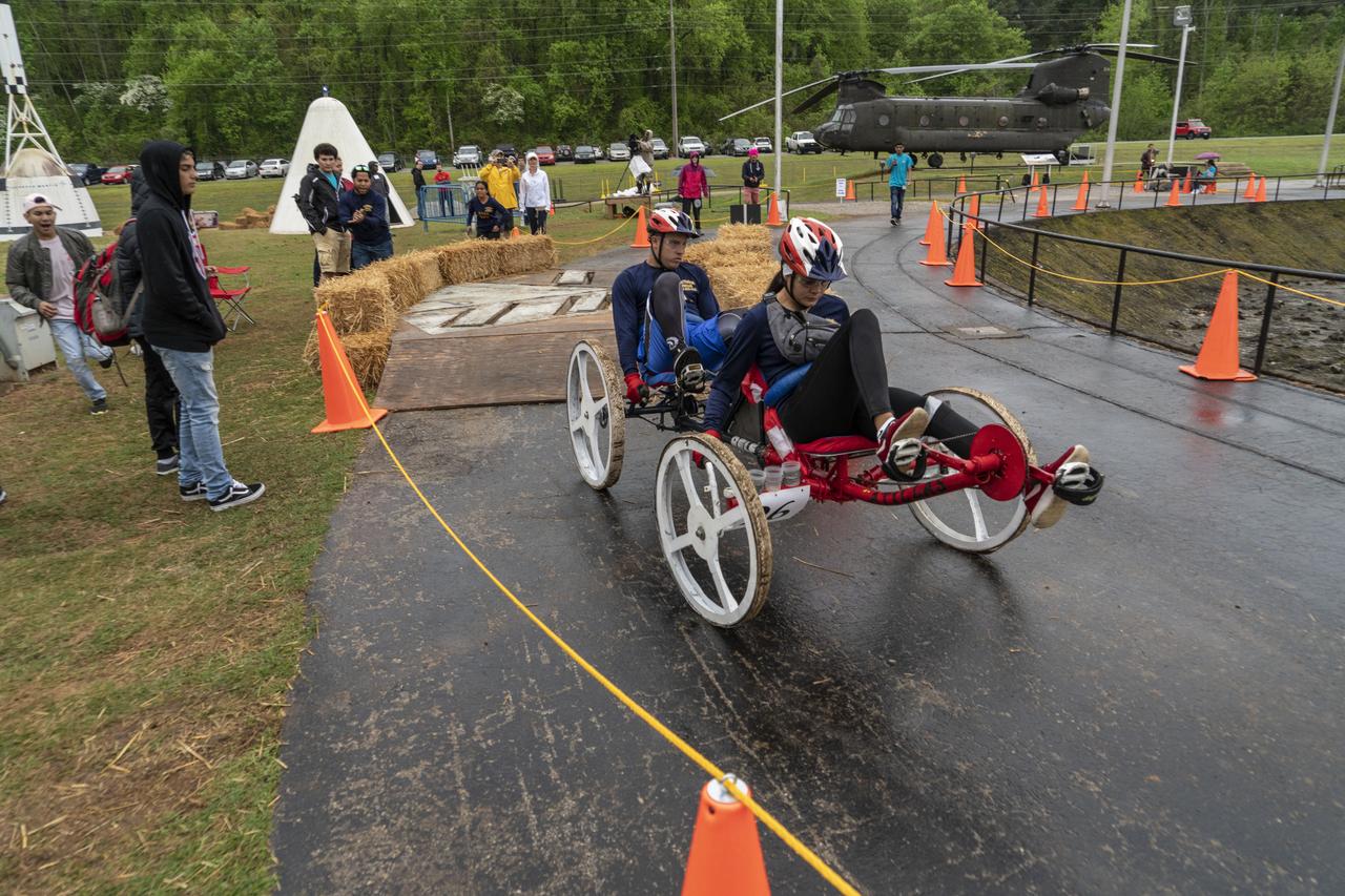 The 2019 Lunar Rover Challenge Competition was hosted by the U.S. Space and Rocket Center in Huntsville, Alabama. This annual event celebrated the 25th anniversary of what began as the Great Moonbuggy Race in 1994. High school and College teams from the United States and foreign countries competed. The awards ceremony was held at the adjacent Marriott on Saturday evening.