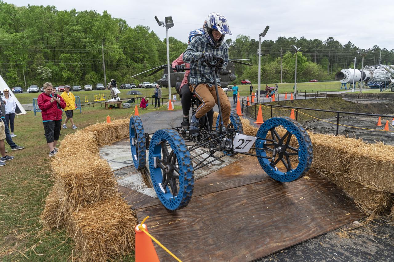 The 2019 Lunar Rover Challenge Competition was hosted by the U.S. Space and Rocket Center in Huntsville, Alabama. This annual event celebrated the 25th anniversary of what began as the Great Moonbuggy Race in 1994. High school and College teams from the United States and foreign countries competed. The awards ceremony was held at the adjacent Marriott on Saturday evening.