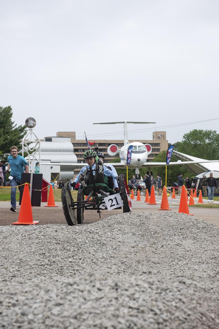 The 2019 Lunar Rover Challenge Competition was hosted by the U.S. Space and Rocket Center in Huntsville, Alabama. This annual event celebrated the 25th anniversary of what began as the Great Moonbuggy Race in 1994. High school and College teams from the United States and foreign countries competed. The awards ceremony was held at the adjacent Marriott on Saturday evening.