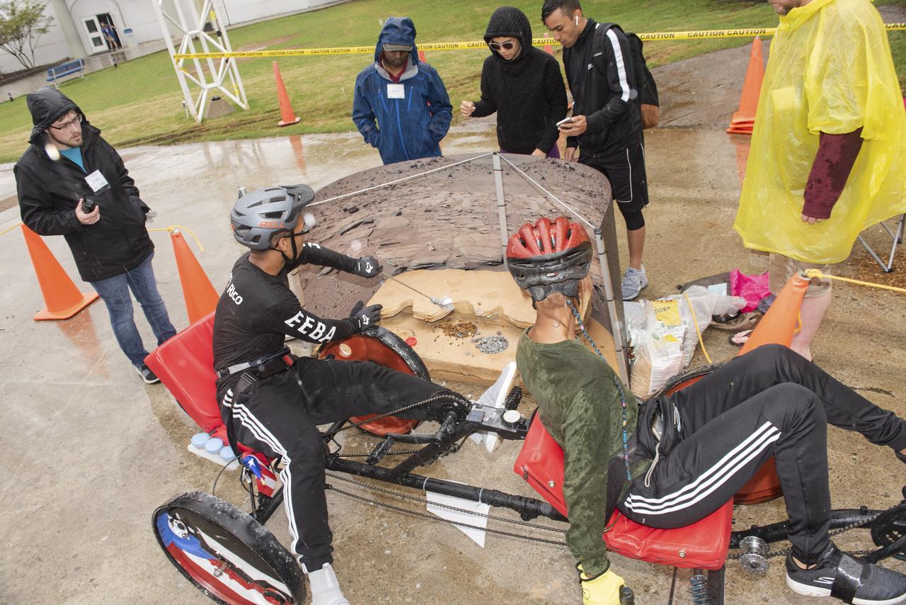 The 2019 Lunar Rover Challenge Competition was hosted by the U.S. Space and Rocket Center in Huntsville, Alabama. This annual event celebrated the 25th anniversary of what began as the Great Moonbuggy Race in 1994. High school and College teams from the United States and foreign countries competed. The awards ceremony was held at the adjacent Marriott on Saturday evening.