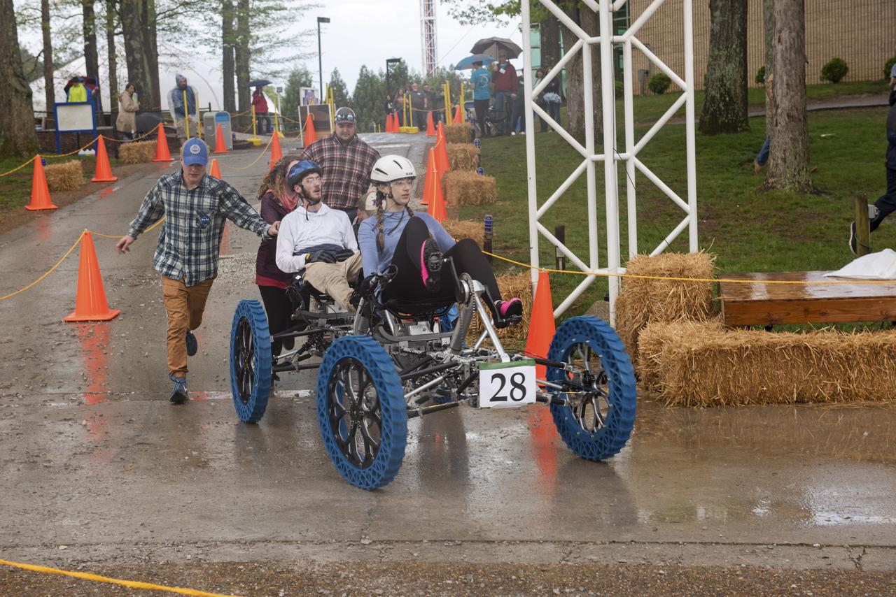 The 2019 Lunar Rover Challenge Competition was hosted by the U.S. Space and Rocket Center in Huntsville, Alabama. This annual event celebrated the 25th anniversary of what began as the Great Moonbuggy Race in 1994. High school and College teams from the United States and foreign countries competed. The awards ceremony was held at the adjacent Marriott on Saturday evening.