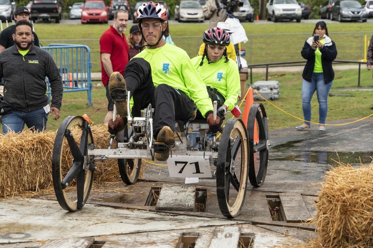 The 2019 Lunar Rover Challenge Competition was hosted by the U.S. Space and Rocket Center in Huntsville, Alabama. This annual event celebrated the 25th anniversary of what began as the Great Moonbuggy Race in 1994. High school and College teams from the United States and foreign countries competed. The awards ceremony was held at the adjacent Marriott on Saturday evening.