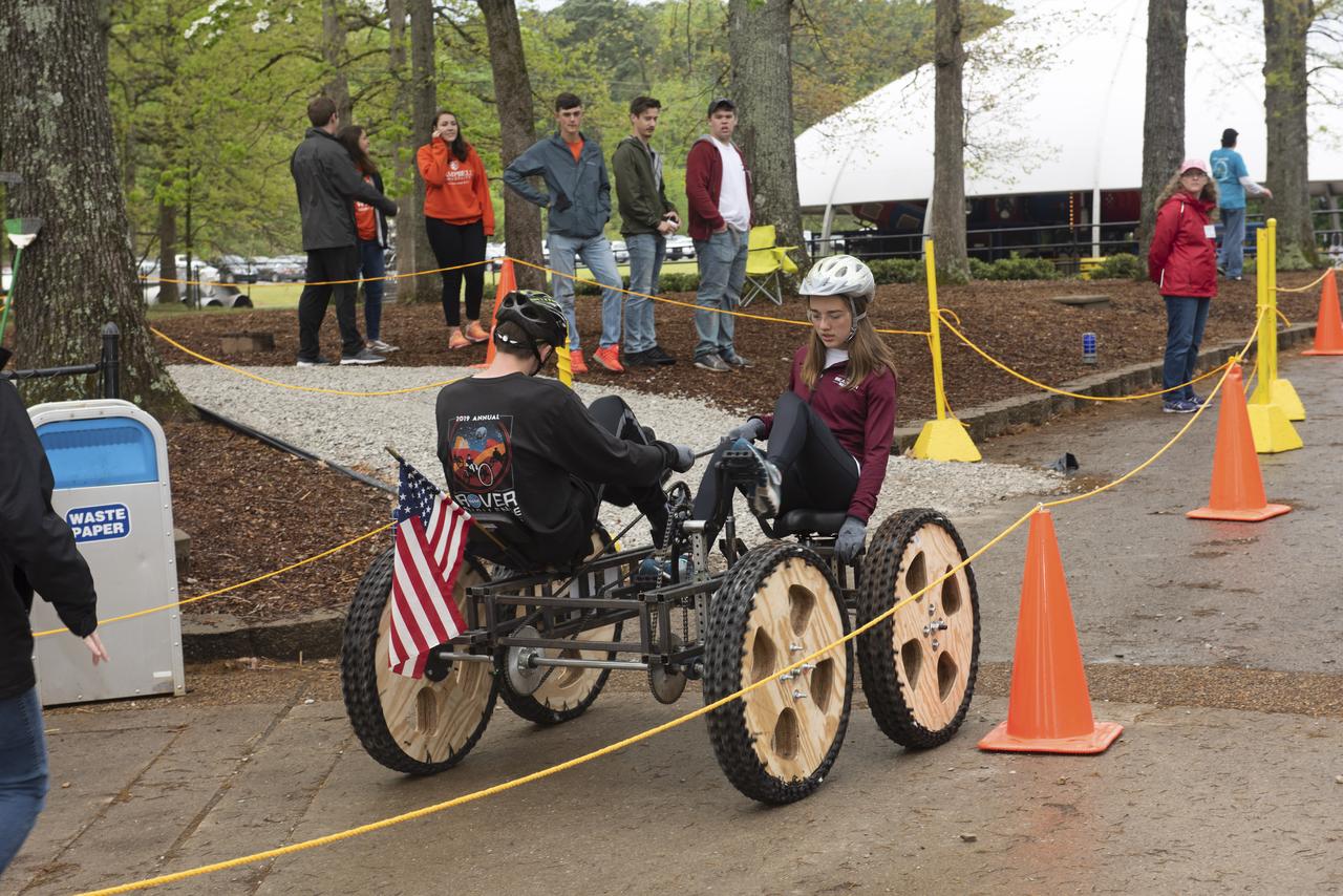 The 2019 Lunar Rover Challenge Competition was hosted by the U.S. Space and Rocket Center in Huntsville, Alabama. This annual event celebrated the 25th anniversary of what began as the Great Moonbuggy Race in 1994. High school and College teams from the United States and foreign countries competed. The awards ceremony was held at the adjacent Marriott on Saturday evening.