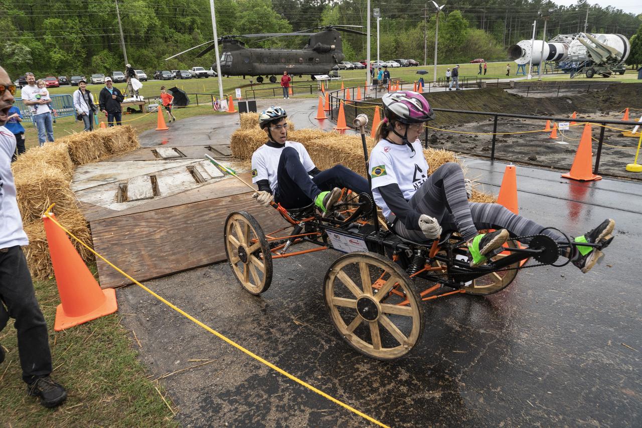 The 2019 Lunar Rover Challenge Competition was hosted by the U.S. Space and Rocket Center in Huntsville, Alabama. This annual event celebrated the 25th anniversary of what began as the Great Moonbuggy Race in 1994. High school and College teams from the United States and foreign countries competed. The awards ceremony was held at the adjacent Marriott on Saturday evening.
