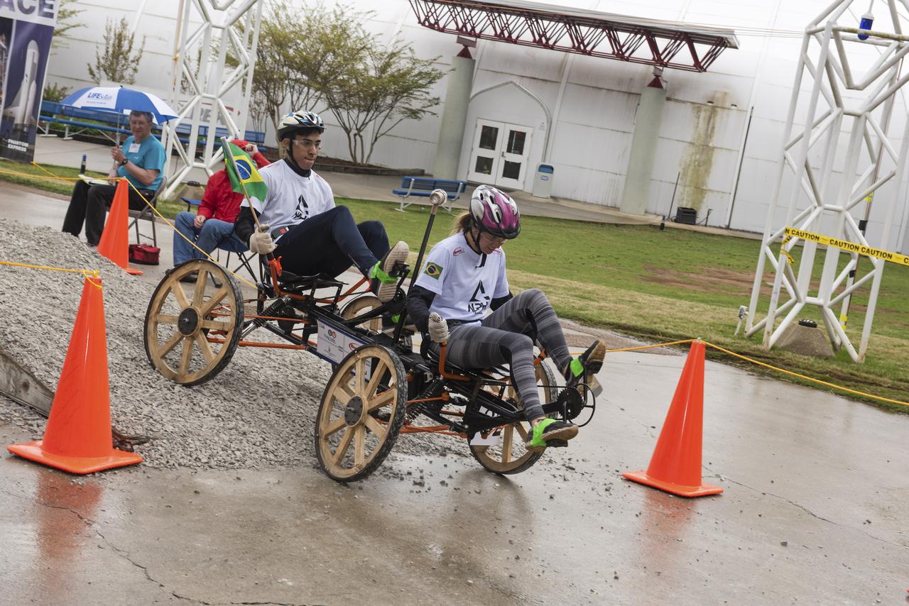 The 2019 Lunar Rover Challenge Competition was hosted by the U.S. Space and Rocket Center in Huntsville, Alabama. This annual event celebrated the 25th anniversary of what began as the Great Moonbuggy Race in 1994. High school and College teams from the United States and foreign countries competed. The awards ceremony was held at the adjacent Marriott on Saturday evening.
