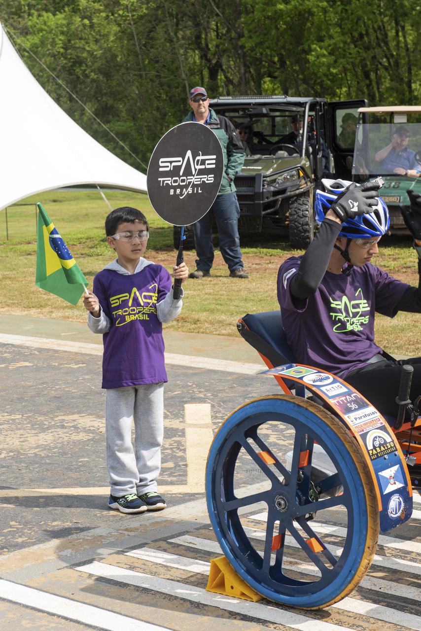 The 2019 Lunar Rover Challenge Competition was hosted by the U.S. Space and Rocket Center in Huntsville, Alabama. This annual event celebrated the 25th anniversary of what began as the Great Moonbuggy Race in 1994. High school and College teams from the United States and foreign countries competed. The awards ceremony was held at the adjacent Marriott on Saturday evening.