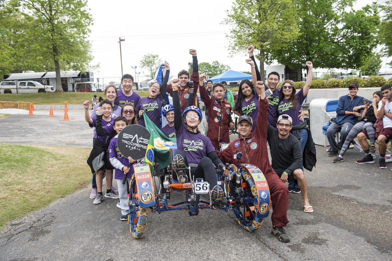 The 2019 Lunar Rover Challenge Competition was hosted by the U.S. Space and Rocket Center in Huntsville, Alabama. This annual event celebrated the 25th anniversary of what began as the Great Moonbuggy Race in 1994. High school and College teams from the United States and foreign countries competed. The awards ceremony was held at the adjacent Marriott on Saturday evening.