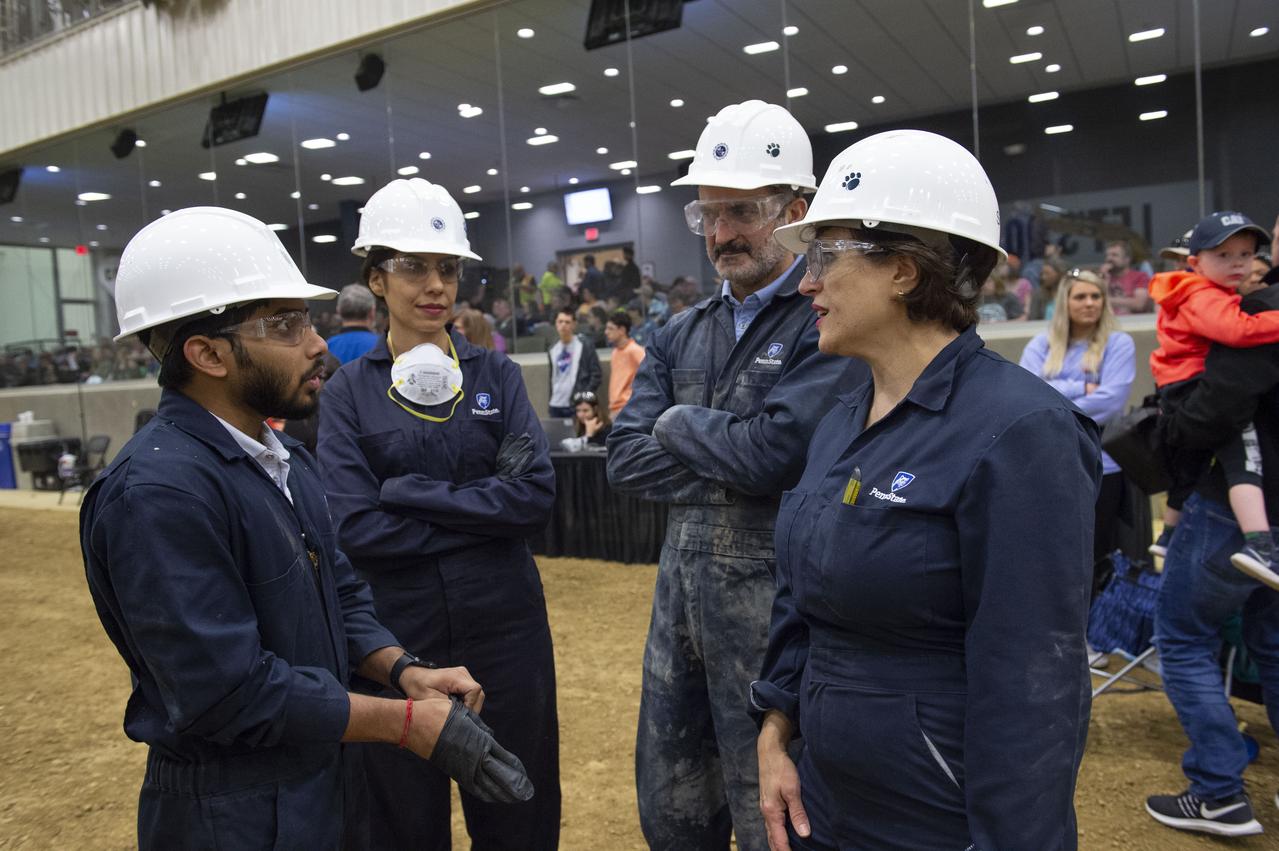 AI. SpaceFactory of New York and Pennsylvania State University of College Park print subscale habitat structures at NASA's 3D-Printed Habitat Challenge, held at the Caterpillar Edwards Demonstration & Learning Center in Edwards, Illinois, May 1-4, 2019. The habitat print is the final level of the multi-phase competition, which began in in 2015. The challenge is managed by NASA's Centennial Challenges program, and partner Bradley University of Peoria, Illinois.  Penn State's printed habitat.