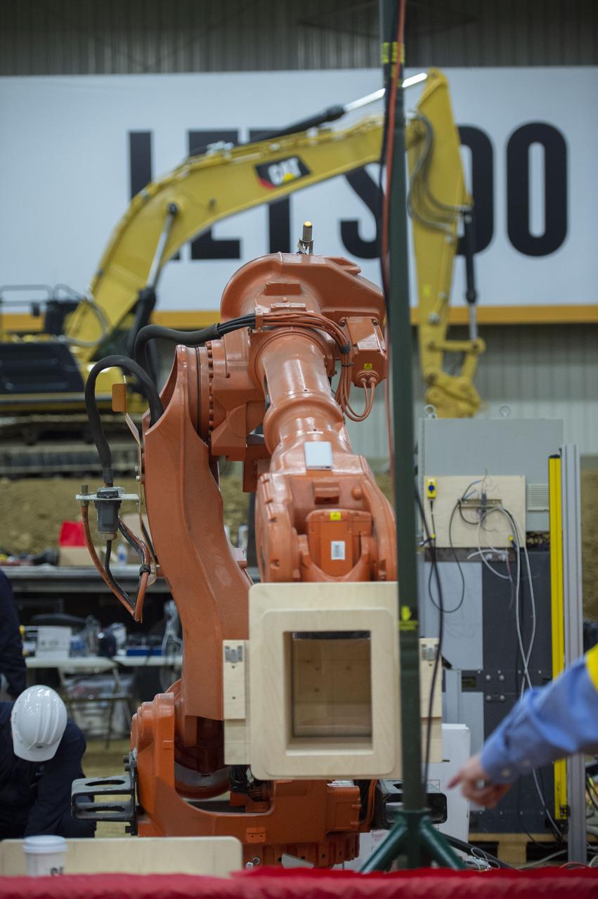 Team Penn State prepares their 3D-printer to begin printing a subscale habitat structure at NASA's 3D-Printed Habitat Challenge, held at the Caterpillar Edwards Demonstration & Learning Center in Edwards, Illinois, May 1-4, 2019. The habitat print is the final level of the multi-phase competition, which began in in 2015. The 3D-Printed Habitat Challenge is a competition to create sustainable shelters suitable for the Moon, Mars or beyond using resources available on-site in these locations. The challenge is managed by NASA's Centennial Challenges program, and partner Bradley University of Peoria, Illinois.