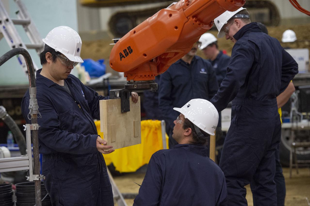 Team Penn State prepares their 3D-printer to begin printing a subscale habitat structure at NASA's 3D-Printed Habitat Challenge, held at the Caterpillar Edwards Demonstration & Learning Center in Edwards, Illinois, May 1-4, 2019. The habitat print is the final level of the multi-phase competition, which began in in 2015. The 3D-Printed Habitat Challenge is a competition to create sustainable shelters suitable for the Moon, Mars or beyond using resources available on-site in these locations. The challenge is managed by NASA's Centennial Challenges program, and partner Bradley University of Peoria, Illinois. 