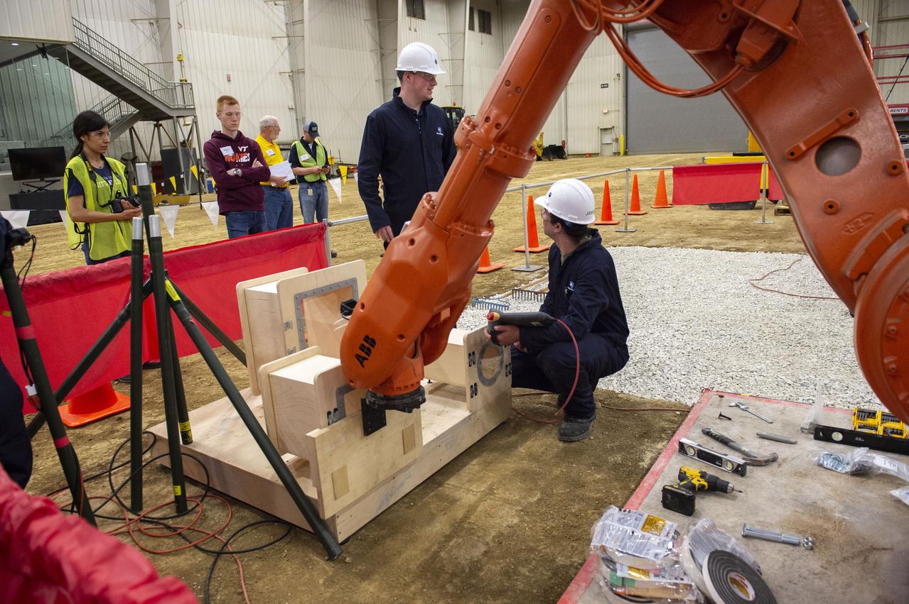 Team Penn State prepares their 3D-printer to begin printing a subscale habitat structure at NASA's 3D-Printed Habitat Challenge, held at the Caterpillar Edwards Demonstration & Learning Center in Edwards, Illinois, May 1-4, 2019. The habitat print is the final level of the multi-phase competition, which began in in 2015. The 3D-Printed Habitat Challenge is a competition to create sustainable shelters suitable for the Moon, Mars or beyond using resources available on-site in these locations. The challenge is managed by NASA's Centennial Challenges program, and partner Bradley University of Peoria, Illinois. 