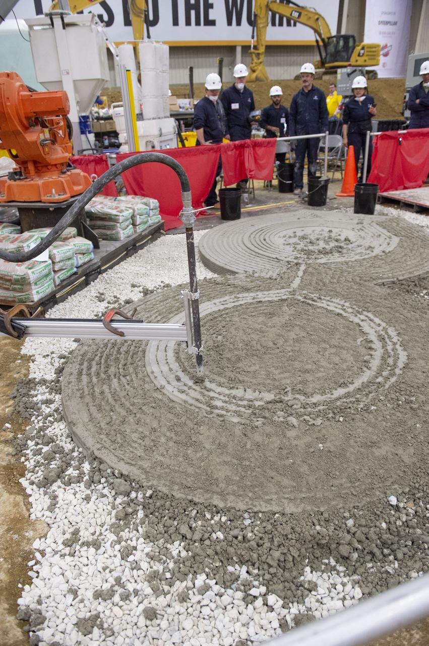Team Penn State prepares their 3D-printer to begin printing a subscale habitat structure at NASA's 3D-Printed Habitat Challenge, held at the Caterpillar Edwards Demonstration & Learning Center in Edwards, Illinois, May 1-4, 2019. The habitat print is the final level of the multi-phase competition, which began in in 2015. The 3D-Printed Habitat Challenge is a competition to create sustainable shelters suitable for the Moon, Mars or beyond using resources available on-site in these locations. The challenge is managed by NASA's Centennial Challenges program, and partner Bradley University of Peoria, Illinois. 