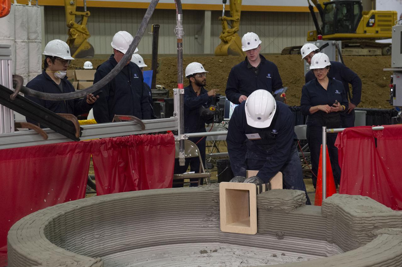 Team Penn State prepares their 3D-printer to begin printing a subscale habitat structure at NASA's 3D-Printed Habitat Challenge, held at the Caterpillar Edwards Demonstration & Learning Center in Edwards, Illinois, May 1-4, 2019. The habitat print is the final level of the multi-phase competition, which began in in 2015. The 3D-Printed Habitat Challenge is a competition to create sustainable shelters suitable for the Moon, Mars or beyond using resources available on-site in these locations. The challenge is managed by NASA's Centennial Challenges program, and partner Bradley University of Peoria, Illinois. 